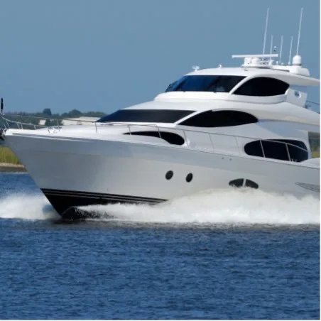 Motor yacht cruising through open water